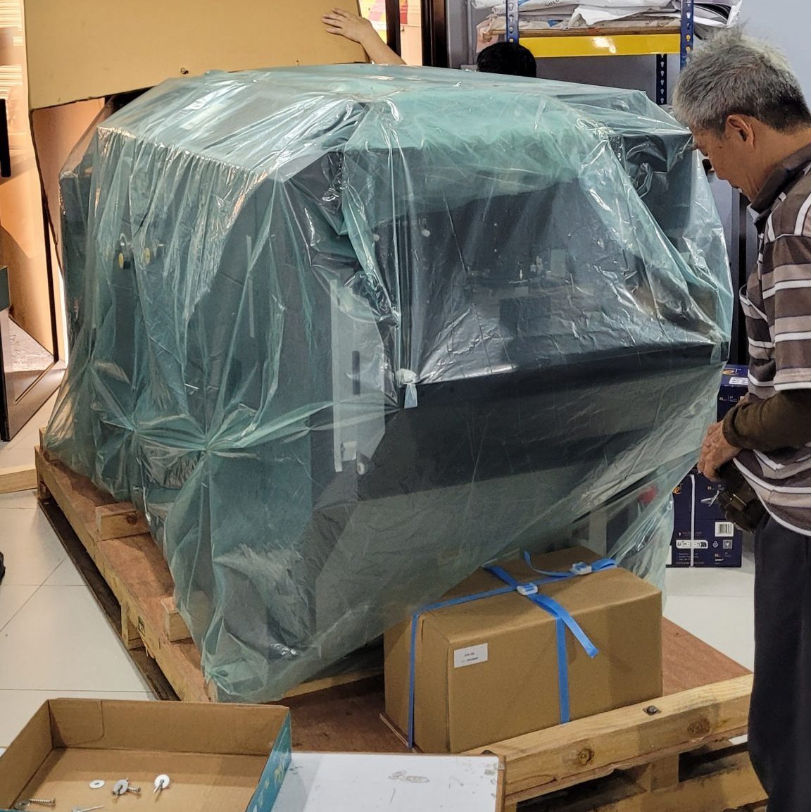 Delivering and unboxing of DPB 500 machine when arrived at customer place at Wangsa Maju.